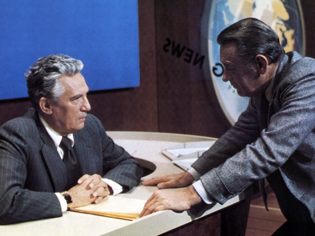 William Holden talks to Peter Finch in Network