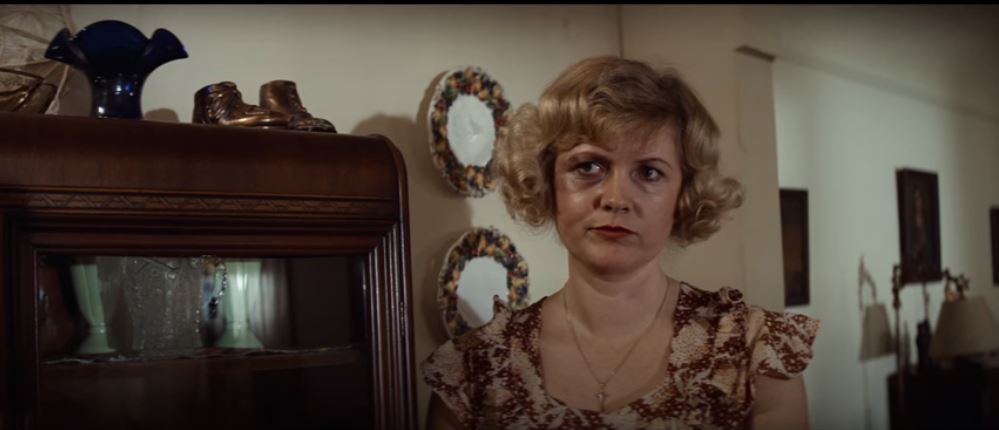 The wife of the Burt Young character from the first scene of Chinatown who now has a black eye