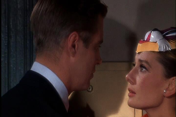 George Peppard and Audrey Hepburn about to kiss in Breakfast at Tiffany's