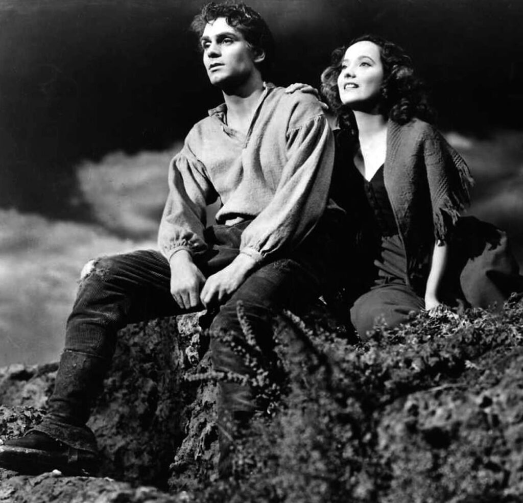 Laurence Olivier and Merle Oberon atop Pennestin Crag in Wuthering Heights, 1939